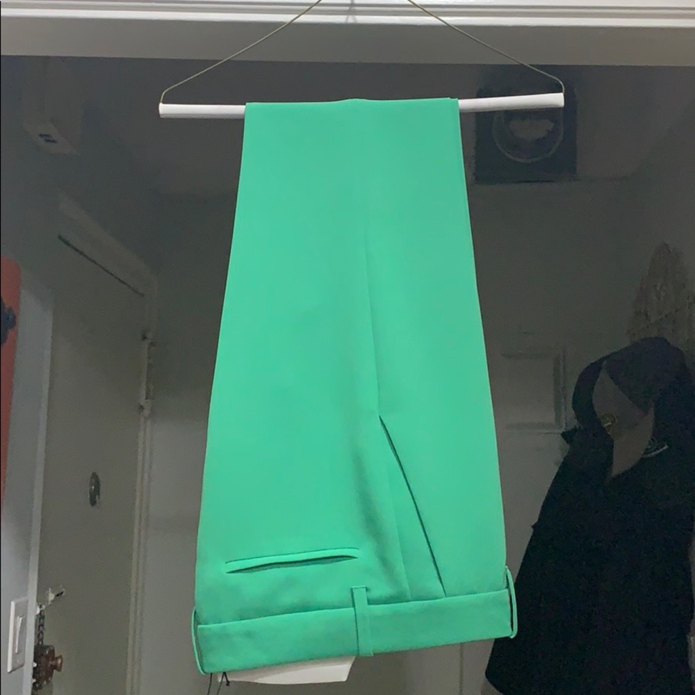 Bright green trousers. Never worn.